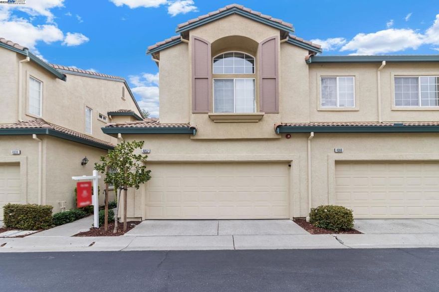BEAUTIFUL MOVE-IN READY HOME IN A PRIME PLEASANTON LOCATION! Zoned for top-rated schools, this 2 bed, 2.5 bath home is the perfect blend of style and comfort. Step inside to find rich hardwood floors throughout a bright, open floor plan. Over $25k in upgrades, this home features a completely renovated gourmet kitchen, fresh paint, new washer/dryer, new water heater, and a new water softener. The 2-car garage features durable epoxy flooring. The open-concept Great Room is perfect for entertaining, flowing out to a serene backyard with elegant pavers. The spacious primary suite is a perfect retreat. Perfectly positioned within walking distance to BART, Kaiser, and shopping. Minutes from Downtown Pleasanton and ACE Train, with parks and trails just a 5-minute walk away. An exceptional home !!