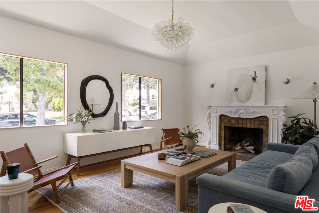 Character home with practical and elegant floor plan in one of Los Feliz's most desirable neighborhoods. Southern exposure fills all the living rooms with sun throughout the day. Private side entrance opens to a foyer leading to vaulted ceilings in the spacious living room with decorative fireplace and formal dining room with bar. An eat-in kitchen with ample storage/pantry, flows seamlessly to a family room that opens directly to a grassy backyard and a finished detached garage. The home features 3 bedrooms + 2.5 bathrooms. The private backyard oasis offers several fruit trees and grape vines as well as room to play, entertain and relax. The 323 square foot rear garage has its own AC and was used as a gym & office. Major systems have already been updated (retrofitted foundation, copper plumbing, clear sewer line and 200amp electrical panel with PAID OFF solar panels) are in good working condition. A recent sale with a similar footprint sold in the neighborhood for over $2.4M. This is a rare opportunity to add value to a well maintained character home in this extremely desirable and walkable neighborhood.