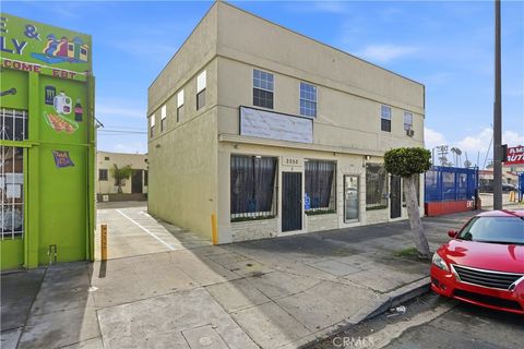 Photo of 2048 W Florence Ave, Los Angeles, CA 90047 (MLS # SR26016226)