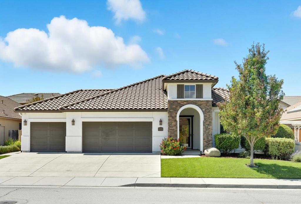 Welcome to Your Hollister Dream Home! Located in one of Hollisters most coveted neighborhoods, this beautifully maintained residence built by Anderson Homes offers comfort, style, and function. A spacious 3 car garage and landscaped front yard set the tone for what awaits inside. Step in to 10 foot ceilings and an open concept layout that flows through the kitchen, dining, and living areas. The updated kitchen features modern cabinetry, granite counters, stainless steel appliances, and recessed lighting. Throughout the home youll find tile floors, carpet in the bedrooms, dual pane windows, and window shutters. The primary suite provides a private retreat with a stall shower and a relaxing soaking tub. Enjoy outdoor living in the manicured backyard with fruit trees including figs, limes, and pomegranates. Perfect for relaxing or entertaining, this home combines thoughtful upgrades with an ideal location.