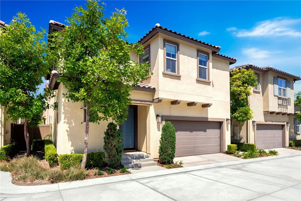Phenomenal, quiet interior location in the highly sought-after gated community of Westgate, this beautiful home was built by Christopher Homes and feels nearly brand new. Offering over 1,700 square feet of living space, the floor plan features 3 spacious bedrooms, 2.5 bathrooms, and a great room. The open concept design highlights a gourmet granite kitchen that flows into the living area. Enjoy a large center prep island with seating, a sunny breakfast nook, white shaker-style cabinets, and upgraded stainless steel appliances including a gas range, microwave, dishwasher, and refrigerator. This home is a LEED Certified Energy Efficient Home, designed to save on utilities while providing healthier, more sustainable living. Thoughtful upgrades can be found throughout, including luxury vinyl flooring, custom bathroom tile, premium carpet, Ultra Premium Dunn Edwards paint, Moen faucets, GWWD windows and sliding door, and a Wayne Dalton garage door. The large primary suite includes a spa-like bathroom with dual sinks and a spacious closet. Upstairs, a convenient laundry room adds functionality. The private backyard features artificial turf for easy, zero-maintenance living. Built less than 10 years ago, the home sits in one of the best spots in the community on the border of Huntington Beach and Westminster. The area is close to freeways, dining, shopping, and entertainment, and falls within the highly regarded Huntington Beach High School District.