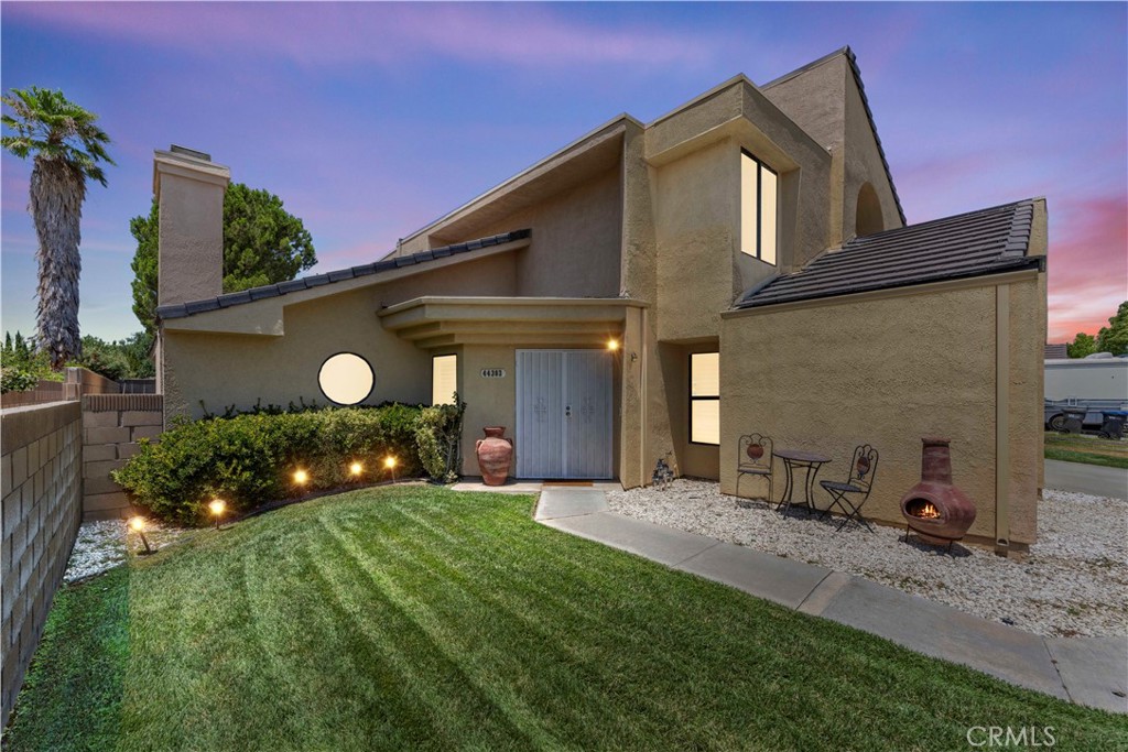 Experience ultimate comfort and style in this stunning 4-bedroom, 3-bathroom home, perfect for hosting and relaxing. The entire first floor features 18x18 ceramic tile flooring, adding sophistication to your living space. Equipped with stainless steel appliances and quartz countertops, the modern kitchen combines style and functionality. A wet bar seamlessly connects the family room and living room, complemented by a formal dining area and a breakfast nook. Plantation shutters throughout, enhancing the home's charm. Enjoy three cozy fireplaces, including a dual-sided one in the primary bedroom and retreat, perfect for cozy evenings. The fifth bedroom serves as a private retreat to the master bedroom, providing a serene haven. Both upstairs bathrooms are full baths with double sinks, and the primary bathroom suite features a walk-in closet, skylight, and private toilet closet. The downstairs bedroom includes an adjacent full bathroom, and all bathrooms have elegant tile floors. Step outside to park-like grounds with an inground swimming pool, covered patio, cabana with a spa, and a built-in barbecue. Block wall fencing ensures privacy, making it the ideal setting for family gatherings. This home is the perfect blend of luxury, comfort, and entertainment, ready for you to make unforgettable memories. Close to schools and shopping.