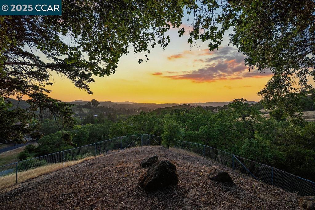 With some of the most spectacular views in the county and tucked away on over ten (10) acres of tranquil, sun-drenched land, this rare and well maintained Mid-Century Modern gem offers a harmonious blend of architectural integrity (award winning architect, Hirsch Morton) and pastoral charm. 575 Morecroft Rd captures the essence of classic California living with clean lines, timeless finishes, and an authentic connection to the surrounding landscape. This 4-bedroom, 3-bath residence remains largely in its original form, showcasing warm wood tones, expansive glass walls, and period details that pay homage to its heritage. The open concept living spaces invite light and nature in, creating a seamless flow between indoors and out while enjoying panoramic views. For equestrian enthusiasts, the property features a well-maintained ±3,000 SF 8-stall / 8-paddock horse barn (75’X40’), a covered and lit round pen (54’ dia.), and direct access to miles of trails and Las Trampas State Park. Parcel Division Likely: The northside of the parcel features an access and utility easement for no more than three (3) additional residences. There are no city approvals in place. Easement access is from Leeward Glen Road which is off Rohrer Drive.
