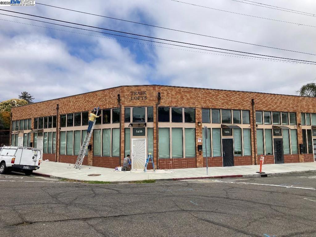 This spacious versatile two bedroom, two -bath live/work condo is located in Oakland's Maxwell Park neighborhood. You can run a business from home with plenty off street parking for your customers. The entire building was renovated to create a modern and sleek two-story spaces with smart home features. The main level features a large open-plan living room/kitchen flexible space with double height windows and tall ceilings great for personal living combined with retail/office space with closet storage, an ADA-bathroom, a bedroom or office on the first floor allows for handicap access. The upper level features a flexible open loft space, more closet storage and a large primary suite including bath/bedroom. Conveniently located near many neighborhood restaurants and public transportation.