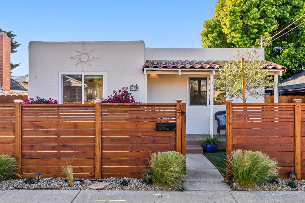 Just minutes from the beach and the scenic Monterey Rec Trail, this Spanish-style bungalow blends timeless charm with modern sophistication. Inside, the open floor plan is filled with natural light and features a beautifully remodeled kitchen with quartz countertops, stainless-steel appliances, and designer tile accents. The updated bathroom and two inviting bedrooms create a comfortable retreat that feels both stylish and practical. Step outside to your private, fenced yard an entertainers dream with low maintenance landscaping, multiple patios, and sunny sitting areas perfect for dining al fresco, gathering with friends, or simply relaxing in the Monterey sunshine. Set in one of Montereys most desirable sunbelt neighborhoods, this home offers more than just a place to live its a lifestyle. Walk or bike to the coast, enjoy nearby dining and recreation, and come home to your own private sanctuary.
