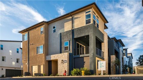 Photo of 118 Abacus, Irvine, CA 92618 (MLS # OC26001427)