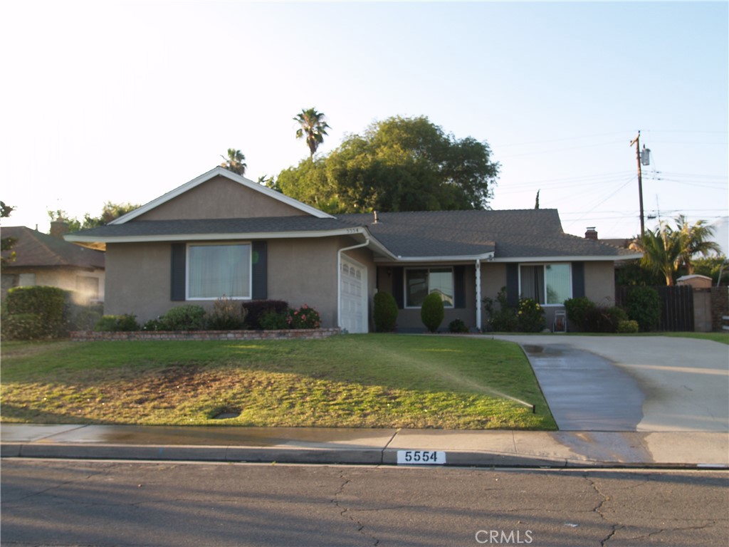 Located in most desirable area of Montclair-close to Costco, mall, bus system and freeway access. Home in mint condition, new carpet and paint throughout, 2" blinds, new ceiling fans in all 4 bedrooms. Large country kitchen w cabinets galore w/ breakfast counter area. Updated windows, both bathrooms have been updated and all new plumbing under and throughout the home. Rock fireplace in living room. Large private backyard w/block walls and newer built free standing alumawood patio cover. Auto sprinklers front and back. Plenty of room to park 3 cars or a small RV in the driveway. Lots of storage in 2 car garage with auto opener. Looking for long term tenants only! NO PETS Please.