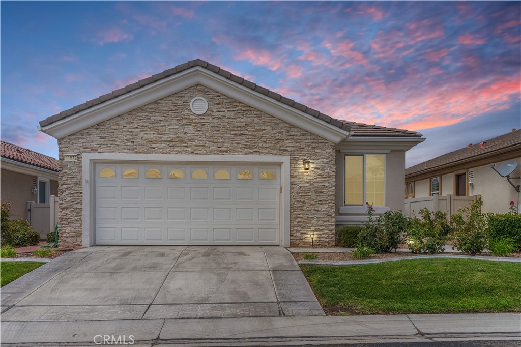 Welcome to this beautiful home located in the highly sought-after 55+ Del Webb community of Apple Valley. Situated on a quiet cul-de-sac right next to the golf course, this 2-bedroom, 2-bathroom home with an additional den offers the perfect blend of comfort and convenience. Step inside to an inviting open floor plan featuring an updated kitchen with modern finishes and spacious living areas ideal for entertaining. Both bathrooms have been tastefully updated, adding a touch of elegance throughout. The home also includes a 2-car garage for ample storage and parking. Enjoy the outdoors with a fully landscaped front and backyard, as well as a covered back patio perfect for relaxing or hosting guests. This is resort-style living at its finest in one of Apple Valley’s best communities. Schedule a tour today!