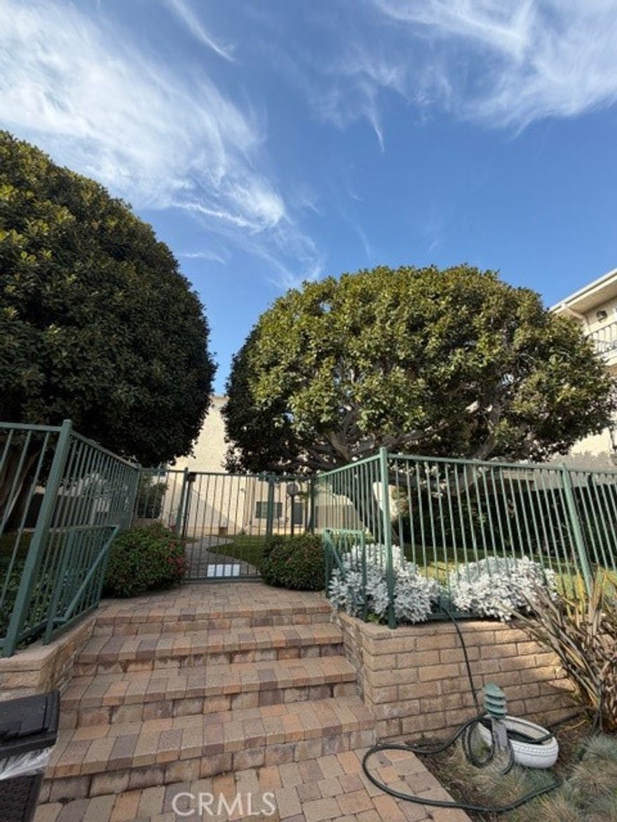 Delightful condo with relaxing courtyard view & only minutes away from all the wonderful dining and shopping options Pasadena has to offer! The living area is blessed with large sliding glass doors that let in plenty of sunlight & open to a balcony overlooking the tranquil and nicely manicured courtyard & poolside below. New carpeting installed throughout & a stylishly updated kitchen features Dolce Vita quartz countertops & 2-toned cabinets with satin nickel hardware. In the hallway, the half bath is enhanced by sophisticated wainscotting & an ample linen closet. The primary bedroom is spacious & bright with enough space for an office set up and accompanied by a generous full bathroom that has been tastefully redone. This popular complex is very well managed and maintained with affordable HOA dues.