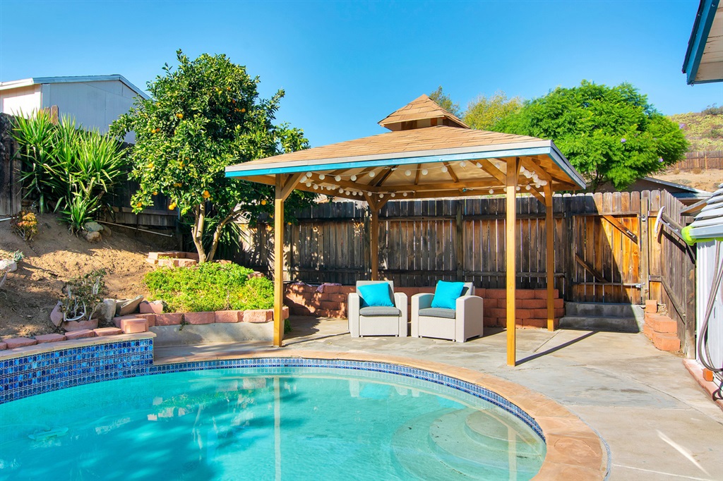 THIS GORGEOUS SINGLE-STORY HOME IS ON A CORNER LOT THAT HAS EVERYTHING YOU ARE LOOKING FOR! HUGE GOURMET GRANITE KITCHEN W/BUILT-IN CUSTOM BENCH W/TONS OF CABINETS & PULL-OUT SHELVES, GAS STOVE. LARGE LIVING ROOM & FORMAL DINING. BIG MASTER RETREAT W/2 CLOSETS & JACUZZI TUB. DUAL PANE WINDOWS, A/C,WATER SOFTENER & DESIGNER PAINT THROUGHOUT! ENORMOUS FAMILY ROOM W/BEAUTIFUL WOOD LAMINATE FLOORINGS THAT LEADS TO A PRIVATE RESORT W/SPARKLING POOL SURROUNDED BY PROFESSIONAL LANDSCAPING! (SEE BELOW) THIS GORGEOUS SINGLE-STORY 3 BEDROOMS & 2 BATH HOME ON A CORNER LOT HAS EVERYTHING YOU ARE LOOKING FOR! HUGE GOURMET GRANITE KITCHEN WITH STAINLESS STEEL SINK AND BUILT-IN CUSTOM BENCH & TABLE WITH PLENTY OF CABINETS FOR STORAGE WITH PULL-OUT SHELVES, GAS STOVE AND NEWER APPLIANCES. LARGE LIVING ROOM AND FORMAL DINING AREA WITH WOODEN SHUTTERS & PLENTY OF NATURAL LIGHTING. BIG MASTER RETREAT WITH 2 CLOSETS & EXTRA STORAGE UNIT AND TILED BATHROOM WITH JACUZZI TUB. THIS HOME HAS DUAL PANE WINDOWS, A/C, WATER SOFTENER & WATER FILTRATION, FANS IN ALL ROOMS, SPACIOUS BEDROOMS, BEAUTIFUL TILED FLOORINGS AND DESIGNER PAINT THROUGHOUT! ENORMOUS FAMILY ROOM WITH BEAUTIFUL WOOD LAMINATE FLOORINGS THAT LEADS TO A PRIVATE RESORT WITH SPARKLING POOL THAT IS SURROUNDED BY PROFESSIONAL LANDSCAPING WITH TROPICAL PALM TREES, CITRUS & FRUIT TREES, MANICURED LAWN, AUTOMATIC SPRINKLER SYSTEM ALL IN A PRIVATE BACKYARD! CLOSE TO SHOPS & RESTAURANTS AND EASY FREEWAY ACCESS! A MUST SEE!. Neighborhoods: LAKESHORE TERRACE Equipment: Pool/Spa/Equipment, Water Filtration Other Fees: 0 Sewer: Sewer Connected