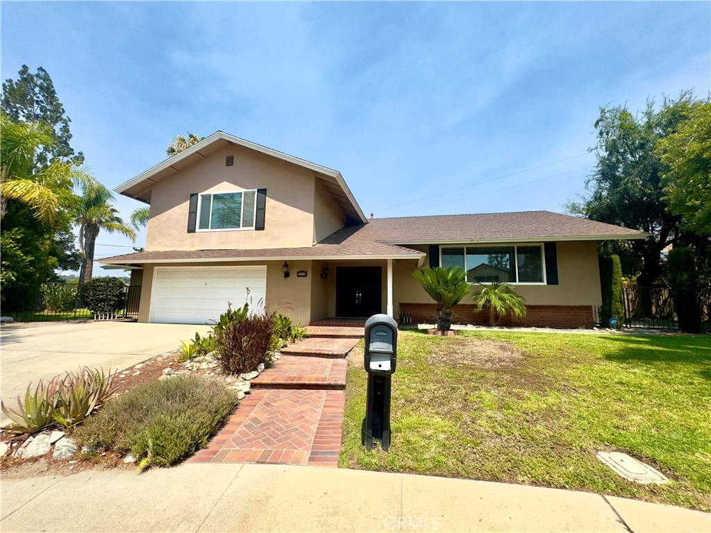 Welcome to your new home! This spacious and beautifully updated tri-level residence offers 5 bedrooms, 3 full bathrooms, and overflows with charm and functionality.
Located on a peaceful cul-de-sac in desirable North Claremont, this home features fresh interior paint and new carpet throughout. The main level includes a large formal living room, an elegant dining room, and an updated kitchen complete with granite countertops, ample cabinetry, and stainless steel appliances—perfect for home chefs.
Enjoy the expansive family room with a cozy fireplace, ideal for gatherings and relaxation. This home is designed with entertaining in mind, offering plenty of indoor and outdoor space.
The layout includes:
An oversized bedroom suite upstairs
Two additional bedrooms upstairs
Two bedrooms downstairs, great for guests, a home office, or multi-generational living
Additional features include:
Dual-pane windows and sliding glass doors
Large two-car garage with built-in shelving for storage
Fully fenced backyard with a covered patio and lush landscaping for serene outdoor living
No pets and no smoking home
Conveniently located near parks, schools, shopping, and freeways. Don't miss your chance to lease this exceptional North Claremont home!