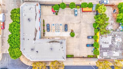 Photo of 702 W Holt Avenue, Pomona, CA 91768 (MLS # PW25260213)