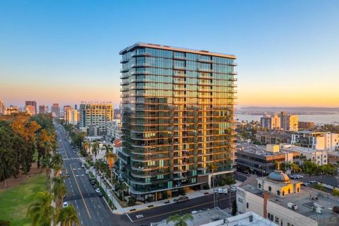 Photo of 525 Olive St #1912, San Diego, CA 92103 (MLS # 260007026SD)