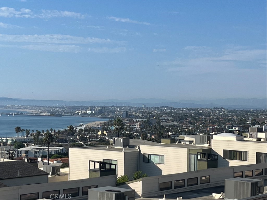 Simply stunning views of the Pacific including the coveted Queen's Necklace coastline view are awaiting you in this rare opportunity to enjoy luxury living at a fabulous price in Hollywood Rivera. Village Palos Verdes was renovated on the exterior and this unit received a spectacular interior makeover as well. There is an easy front door entrance from the street or from the direct access 2 car garage. Step inside to an open floor plan with a freshly painted interior of soft tones, remodeled kitchen and baths, like new carpet, wood flooring, quality dual paned windows and sliding doors, and a variety of noticeable appointments. The 1554 sqft of spaciousness is well presented within 2 bedrooms plus a bonus room with access to the unit's peaceful courtyard/patio. Both the primary suite and the living room sliding doors provide access to outside decks with ocean views and influences, and, the primary suite coastline views will be unforgettable. The carefully planned reconfigured kitchen has Viking appliances, white cabinetry, quartz counter tops and Mother of Pearl tiling. The living room has an elegant linear glass rock fireplace, and the primary bath was recently remodeled along with a fully organized walk in closet. High quality interior doors and hardware, additional lighting and new fixtures, the new kitchen and bath cabinetry all add to the elegant makeover. Additionally, a security system, garage storage systems and epoxy coated floor, enhanced landscaping on patio, and much more to see and experience. Enjoy the relaxing pool and spa which are just a few hundreds steps away, a well maintained HOA, and the popular Village of restaurants, shopping and other conveniences. Click on the 360 virtual tour for the best experience.