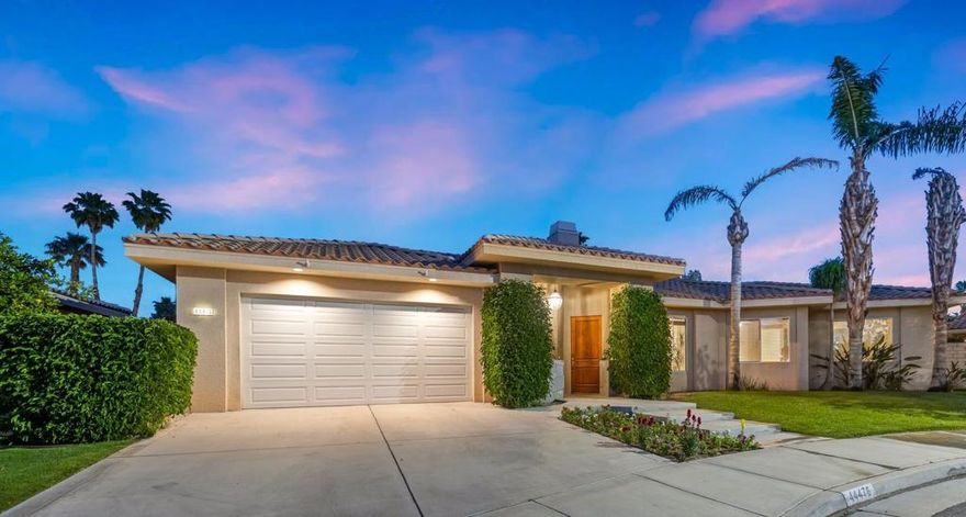 Exceptional 4-bedroom, 3.5-bath custom home located in the highly desirable central Palm Desert community of The Grove with beautiful mountain views. This well-designed residence offers an open-concept layout with 12-foot double sliding doors that create a seamless indoor/outdoor flow and showcase beautiful mountain views.The home features a spacious primary suite, a private en-suite bedroom, and two guest bedrooms, plus an additional powder room for convenience. The gourmet kitchen boasts custom cabinetry, granite countertops, premium appliances, and abundant storage throughout, including a large laundry room with extra cabinets.  The main living area boast high cathedral ceilings!  Enjoy desert living at its best with a private pool and spa, perfect for relaxing or entertaining. Additional highlights include 8-foot interior doors, energy-efficient solar system, and a 2 car garage with ample storage space.Located close to shopping, world class dining, world class golf, and top-rated schools this home combines quality craftsmanship, comfort, and an ideal Palm Desert location.