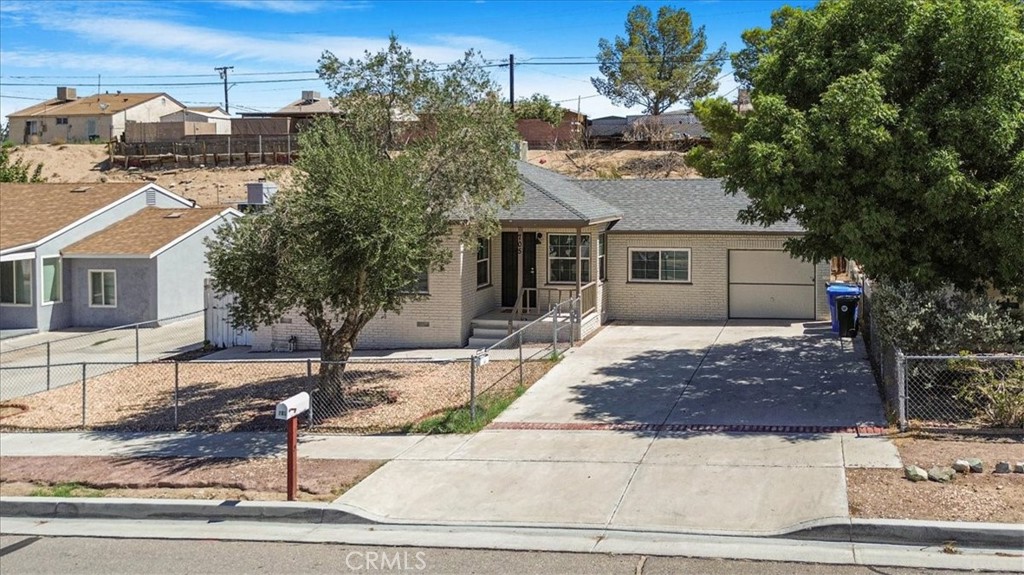 This lovely home is just remodel , fresh paint the exterior and interior, you will find vinyl floors throughout the house. New modern kitchen cabinets and quartz countertops. This property offers 3 bedrooms, 2 of them with walk-in closets. In the bathrooms, you will find updated vanities and sinks. The open floor provides ample natural light and a clean look, thanks to the new recessed lights. Attached 2-car garage. A large backyard where you can enjoy your evenings on the porch, added bonus, the roof was just new. You will find Elementary, junior high, and high school within 1.50 miles. Close to shopping centers and more. Just a block away, you have City Hall and local law enforcement.