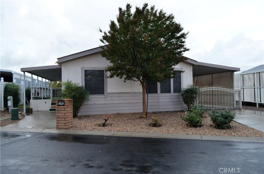 55+ community of Fairview Mobile Home Park, and being sold in as is condition. With a little vision this home has tons of potential. Pricing reflects conditions and this home will need some tender love and care.  3 bedroom; 2 bath open floor plan with option to use 3rd bedroom as a work from home office/game room.   Large spacious kitchen with plenty of storage.  Car port and exterior shed for extra storage.  This property has tons of potential!! 55+ Community – Inviting active community perfect for singles or couples – heated pool and hot tub.  Vibrant neighborhood great for walks to connect with neighbors including a dog park.  Large Clubhouse: A perfect gathering space for social events, activities, and meetings. This mobile home offers both comfort and convenience.