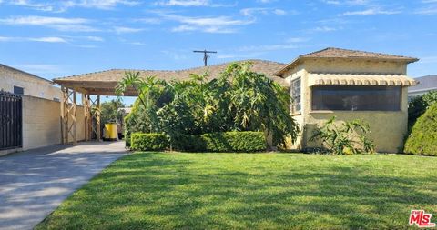 Photo of 10815 S Hoover Street, Los Angeles, CA 90044 (MLS # 26655077)