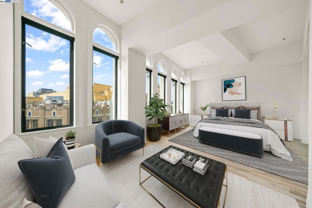 Luxury living at its finest awaits in this top-floor penthouse loft at Marquee Lofts, a stunning live/work conversion in the heart of Oakland’s Uptown. Originally built in the 1920s as an office building, the historic façade remains while the interiors have been transformed into modern sophistication. Soaring ceilings, oversized dual-paned picture windows, and sweeping views create a bright and airy atmosphere, while high-end finishes add to the sense of elegance. The open floor plan allows for endless configuration possibilities, perfect for both entertaining and working from home, with high-speed fiber internet included in the HOA dues. Convenience is unmatched with an assigned parking space in the secured underground garage and direct access to everything Uptown has to offer, right across from the iconic Fox Theater and Uptown Station, and just steps to BART, Lake Merritt, top restaurants, bars, and cultural venues. With a Walk Score of 100, a Bike Score of 93, and a Transit Score of 86, this penthouse offers not just a home, but a lifestyle in one of Oakland’s most exciting neighborhoods.