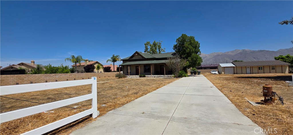 Dreaming of mountain views and small-town charm? Welcome to San Jacinto – where history meets home and historic charm meets natural beauty. Nestled in the scenic San Jacinto Valley and surrounded by mountain views, this growing city offers a relaxed, small-town agricultural feel with convenient access to larger SoCal hubs. Get ready to fall in love with this charming three bedroom, one bath property. This is a very rare opportunity to own a 1901 farm style house situated on a 1 acre lot in San Jacinto with A-1 zoning (light agricultural). Though this home offers a modernized kitchen featuring granite countertops and stainless appliances, it still boasts 1901 charm with period touches throughout and a dream porch. The fenced off lot offers plenty of room for RV and boat parking, as well as potential for adding on or a workshop/large garage. Stunning views of the San Jacinto Mountains is a plus! With the sale of the this property also comes a two bedroom, 1 bath guest house and one car garage on the same lot. This property is ideal for someone with a vision wanting a peaceful, serene property and ready to roll their sleeves up to put their stamp on it. Don't miss your chance to make this incredible house your home. San Jacinto offers: affordable homes, community-friendly vibes, nature trails nearby, over 13 lakes nearby, and local gems like Estudillo Mansion & Soboba Resort. From weekend farmers markets to mountain and lake escapes, San Jacinto is your peaceful slice of SoCal life. Come see why more people are making the move!