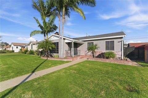 Photo of 9716 S Van Ness Ave, Los Angeles, CA 90047 (MLS # DW26013802)