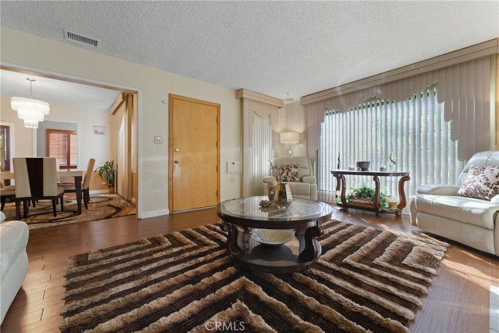 Photo of 9716 S Van Ness Ave, Los Angeles, CA 90047 (MLS # DW26013802)