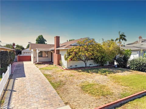 Photo of 9933 Tristan Drive, Downey, CA 90240 (MLS # DW26174864)
