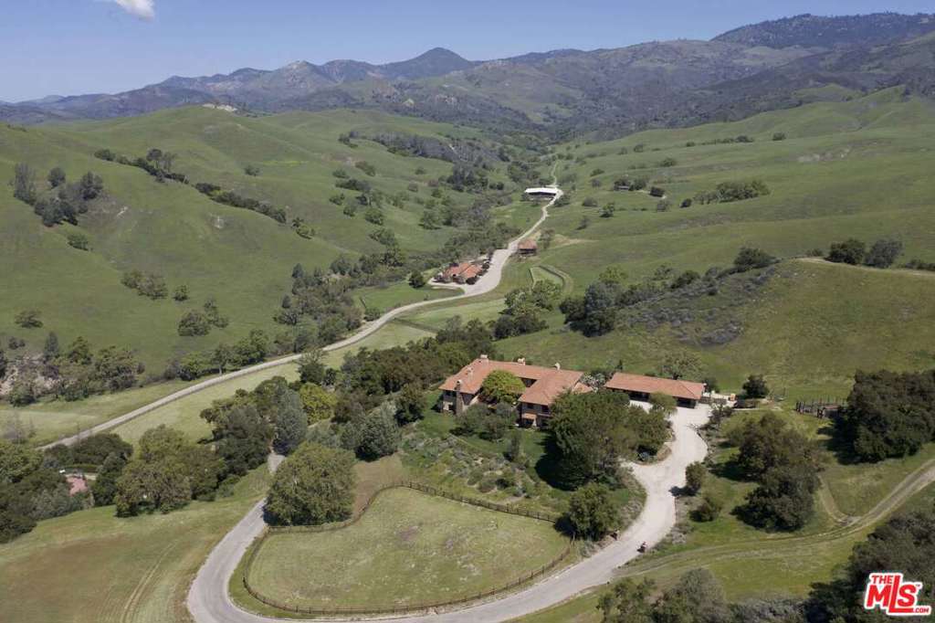 Nestled amongst verdant rolling hills in the prime Santa Ynez Valley, Rancho Latigo offers nearly 4700 acres of pristine bucolic land, a custom-built 14,000SF main residence, published equestrian facilities, 3bedroom guesthouse, helipad, tenniscourt, independent water source, & tremendous possibilities. Featured in Architectural Digest, the lavish main residence built by acclaimed architect David Leavengood features everyamenity imaginable including a wine-cellar, movie theater, gym, wood paneled office, 6 well-appointed en-suite bedrooms, and countless outdoor entertaining areas that surround the enormous swimmer's pool. The show-grade equestrian facilities feature an exquisitely designed & highly-photographed & published 11 stall stable, 10,000SF barn, covered riding arena, and various turnouts. This is a once in a lifetime opportunity to own an incredibly privatetrophyproperty that offers the respite and tranquility of a luxury resort just miles from Los Olivos & Santa Barbara.