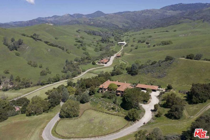 Nestled amongst verdant rolling hills in the prime Santa Ynez Valley, Rancho Latigo offers nearly 4700 acres of pristine bucolic land, a custom-built 14,000SF main residence, published equestrian facilities, 3bedroom guesthouse, helipad, tenniscourt, independent water source, & tremendous possibilities. Featured in Architectural Digest, the lavish main residence built by acclaimed architect David Leavengood features everyamenity imaginable including a wine-cellar, movie theater, gym, wood paneled office, 6 well-appointed en-suite bedrooms, and countless outdoor entertaining areas that surround the enormous swimmer's pool. The show-grade equestrian facilities feature an exquisitely designed & highly-photographed & published 11 stall stable, 10,000SF barn, covered riding arena, and various turnouts. This is a once in a lifetime opportunity to own an incredibly privatetrophyproperty that offers the respite and tranquility of a luxury resort just miles from Los Olivos & Santa Barbara.