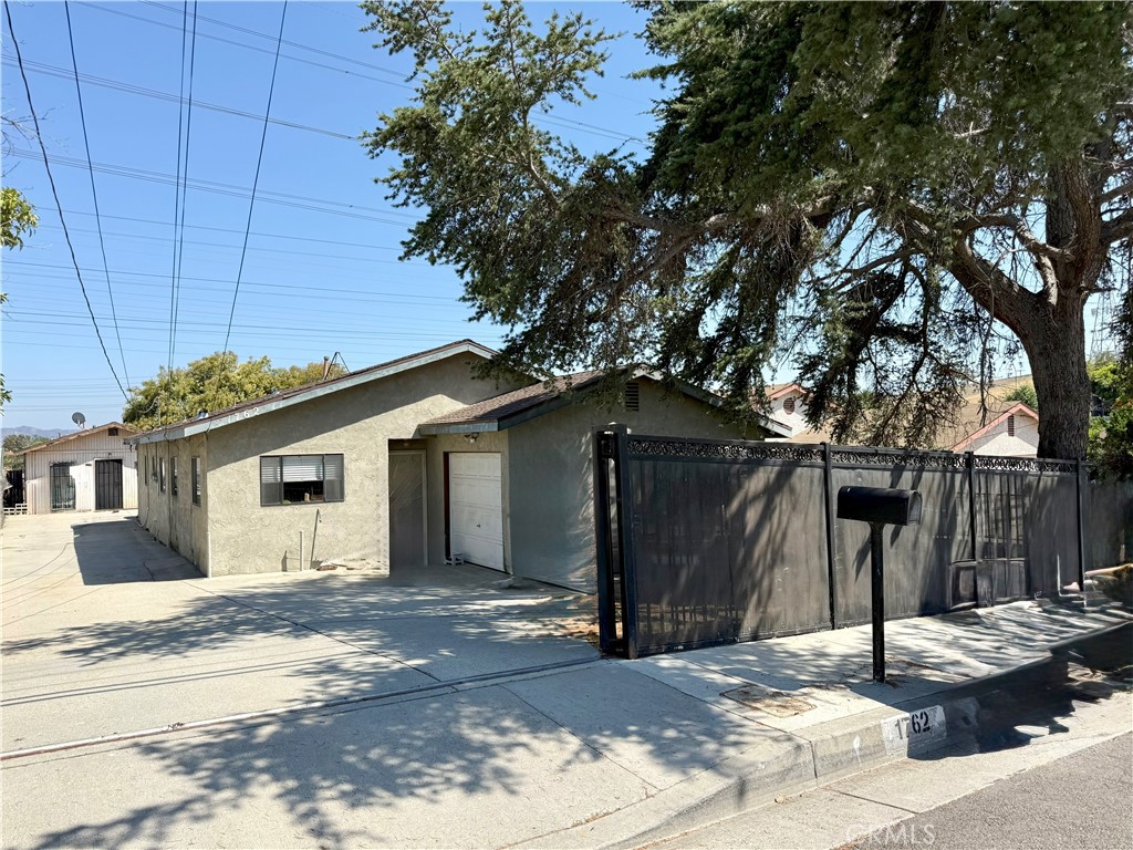 Charming Home with Bonus Space and Endless Potential. Discover comfort, convenience, and investment opportunity in this versatile single-family home, ideally located in the highly desirable area. Located just minutes from The Square Plaza, Walmart, and top-rated schools, with quick access to the 10 and 60 freeways, you'll enjoy unbeatable convenience in a thriving neighborhood.