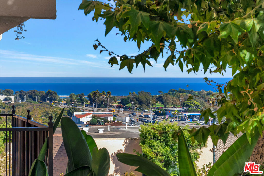 Located in the heart of central Malibu, this desirable single-level condo offers the perfect blend of comfort, convenience, and resort-style living. The thoughtfully designed floor plan features two spacious bedroom suites, a welcoming living room that flows seamlessly into the dining area, and a generous patio where you can relax and take in the ocean views. The gated complex is rich with amenities, including a heated pool with breathtaking ocean and mountain vistas, a fully equipped fitness center, and tennis courts. Two covered parking spaces and 24-hour guard security add to the ease and peace of mind. Ideally situated just moments from Malibu's best restaurants, shopping, markets, and scenic hikes, and only minutes to Pepperdine University. This home is perfect as a full-time residence, weekend getaway, or investment opportunity.