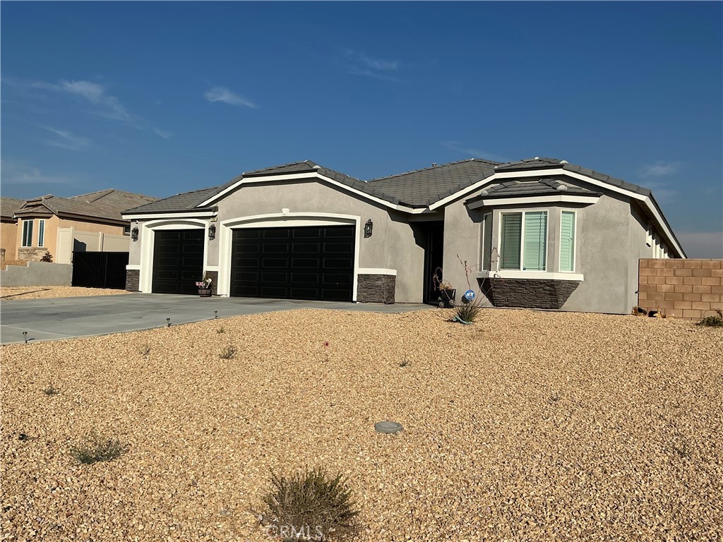 Coming soon in the desirable Rancho Mesa neighborhood of Hesperia! This beautifully maintained 4 bedroom, 2-bath home features an open floor plan, high ceilings, and stylish finishes throughout. The kitchen is a chef’s dream with granite countertops, a large center island, stainless steel appliances, and plenty of cabinet space. Enjoy a spacious living room with a cozy gas fireplace and a separate formal dining area.
The primary suite includes a walk-in closet and a luxurious en-suite bathroom with double sinks, a soaking tub, and a separate shower. Additional highlights include indoor laundry, recessed lighting, upgraded flooring, ceiling fans, and a tankless water heater.
Sitting on a large lot, the backyard is perfect for entertaining or relaxing, with a covered patio, plenty of space for a pool, and a private setting. The home also includes an attached 3-car garage, RV access, and is equipped with paid-off solar panels for energy efficiency and savings ????
No HOA! Located near schools, parks, shopping centers, and with easy access to the 15 freeway. A must-see home in one of Hesperia’s most sought-after communities.