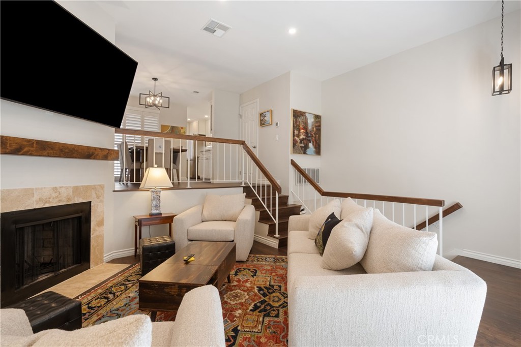 Beautifully updated tri-level condo in one of the best locations in La Mirada! This stunning 2-bedroom, 2.5-bath condo offers a bright, open floor plan with vaulted ceilings and plenty of natural light. Enjoy the private front patio, perfect for morning coffee or evening relaxation. Inside, the spacious living room with a cozy fireplace flows seamlessly into the large dining area, ideal for entertaining. The remodeled kitchen features granite counters, new sink, and updated finishes, while a convenient half bath is located downstairs along with a patio near the dinning room.
Upstairs, you’ll find two master suites, one master has its own balcony as well as walk-in closets and remodeled bathrooms. New flooring throughout, plus new tile in the bathrooms, adds a modern touch.
Additional highlights include central air & heat, a 2-car garage with direct access, and ample guest parking. The gated community is quiet and well-maintained, offering a peaceful retreat with great amenities. Access to pool, BBQ area & outdoor dining spaces
Enjoy the best of La Mirada — a city known for its top-rated schools, friendly neighborhoods, beautiful parks, golf courses, and the renowned La Mirada Theatre for the Performing Arts. Just minutes from shopping, dining, Biola University, Splash! Aquatic Center, and easy freeway access.
This home offers the perfect blend of comfort, style, and community — don’t miss it!