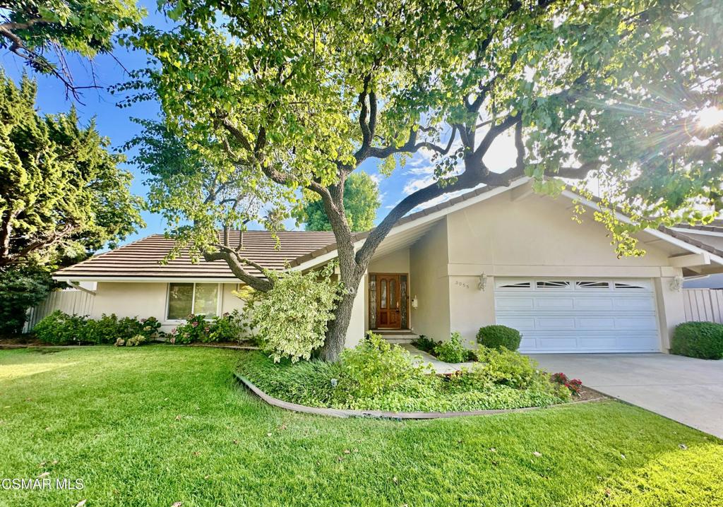 Welcome to this beautifully maintained 1-story home in the highly sought-after Westlake Hills enclave of Thousand Oaks. This Monaco model welcomes you and your guests with a lovely formal entryway that opens to a spacious, open-concept living area with high vaulted ceilings, fireplace, and large dining area. The grand kitchen is a chef's delight, featuring an expansive island with breakfast bar, prep sink, gas cooktop with pop-up ventilation system, granite countertops, stainless steel appliances, SubZero refrigerator, double ovens, built-in microwave, dishwasher, and abundant cabinetry. This generous floor-plan flows effortlessly, leading to an expanded primary suite with serene backyard views, a large bay window and a walk-in closet. A luxurious en suite bathroom offers dual vanities, a walk-in shower, plus a separate soaking tub. Two additional bedrooms and full bathroom with tub-shower provide comfort and flexibility. The private backyard is perfect for relaxing or entertaining, with lush landscaping, mature trees, a large covered patio with a beautiful white metal pergola with electric louvres for adjustable shade at the flick of a switch. A large 2-car garage and full driveway provides plenty of parking. Additional highlights include dual-pane windows, fire-resistant roof tiles, recessed lighting, and a whole-home security system. This property is ideally located moments from Westlake Hills Elementary (just .3 mi), Russell Park, walking paths, hiking trails, shopping, dining, services and award-winning Conejo schools, this home captures the very best of Westlake Village living.