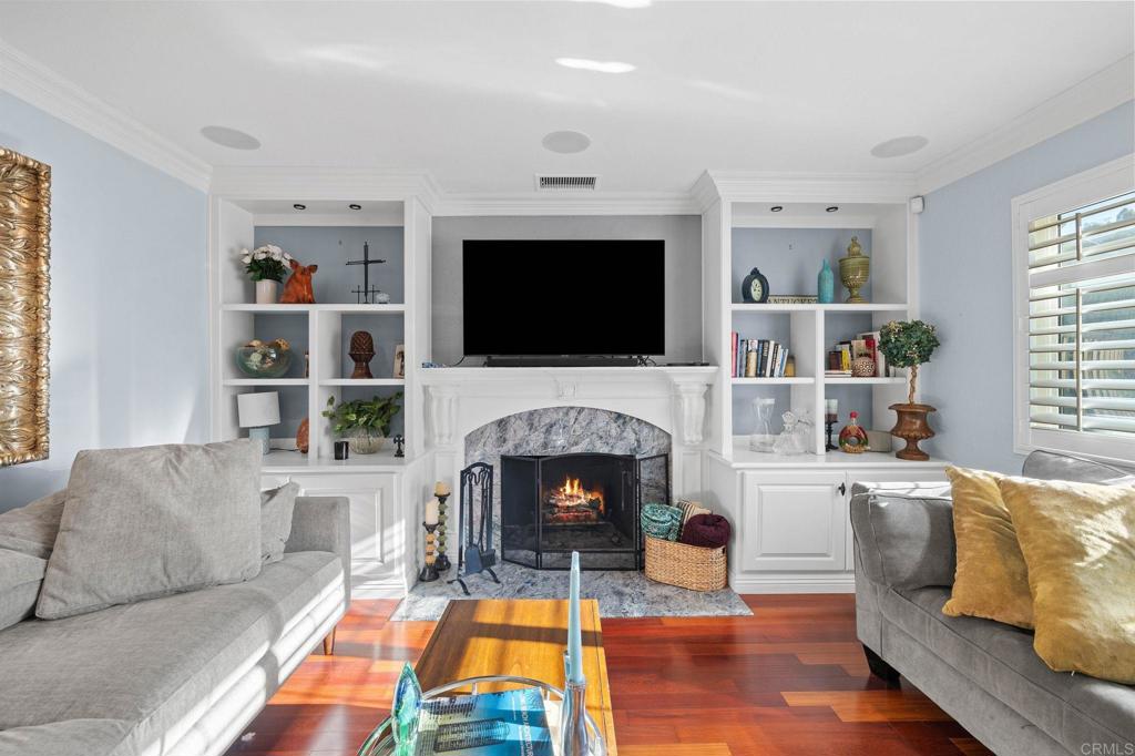 A rare opportunity to own a beautifully remodeled single-story ranch-style home in the highly sought-after Fletcher Terrace neighborhood, where panoramic valley view’s meet timeless design. 3 Bedrooms, 3 Bathrooms, 1,818 sq ft. Two spacious primary suites with custom cabinetry and spa-style bathrooms. Oversized eat-in kitchen with stainless steel appliances and custom pantry. Formal living room with wood-burning fireplace and built-in cabinetry. Bonus office/den ideal for remote work or creative space Hardwood floors, recessed lighting, crown molding, and plantation shutters throughout. 8,000 sq ft corner lot with city lights and valley views. Quiet, well-maintained neighborhood with a low HOA fee. Minutes from Fletcher Parkway’s shops, restaurants, and major thoroughfares. Zoned R1 with top-rated schools nearby. This home is a true standout — blending comfort, style, and convenience in one perfect package. Replastered in-ground pool, hot tub, and custom pergola. Lush drought-tolerant landscaping with mature fruit trees. 3-car garage, solar system, new retaining wall, and upgraded pool equipment.