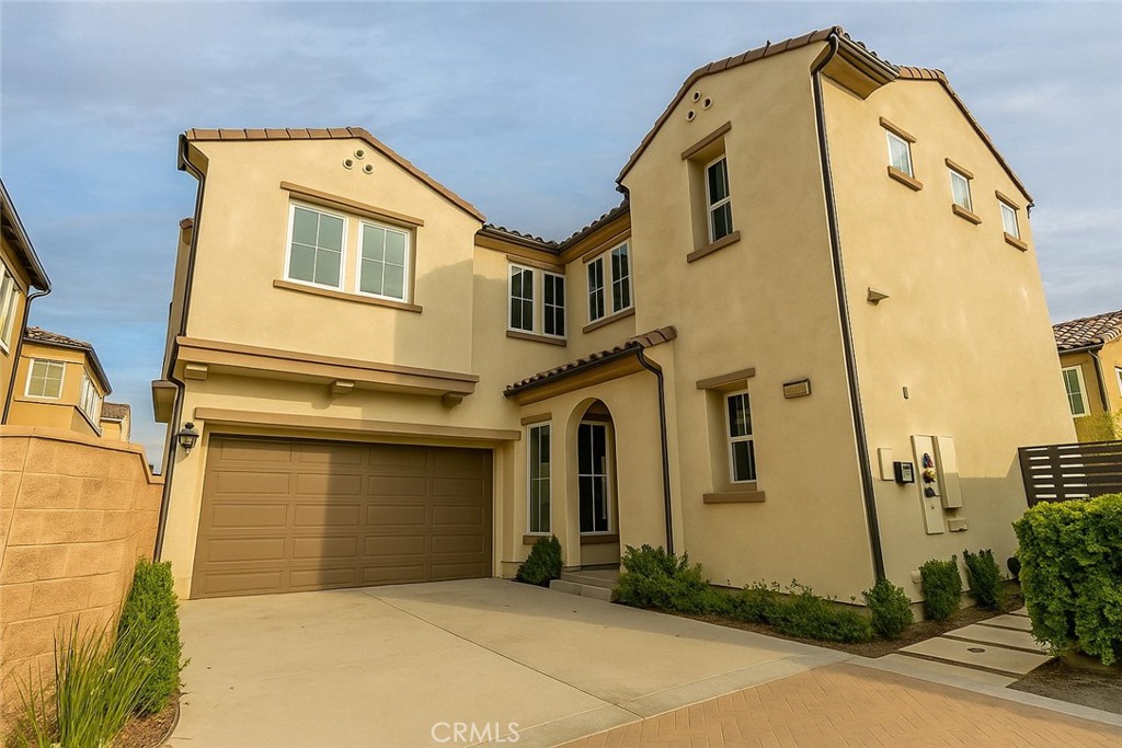 Step into this light-filled, stylish home tucked away in the guard-gated Canyons community with resort-style amenities, including a sparkling pool. The open floor plan is perfect for modern living, featuring a convenient main-floor bedroom, ideal for guests or a home office, and 3 additional bedrooms upstairs, including a large loft and spacious master suite with a walk-in closet.
The heart of the home is its gourmet kitchen, complete with high-end KitchenAid appliances, ceiling-height cabinetry, and a generous island for casual dining or entertaining. Just minutes away, you’ll find the Porter Ranch Vineyards shopping center with Whole Foods, Peet’s Coffee, and many dining options! You're walking distance from the brand new Porter Ranch Community Park — making this a perfect blend of style, comfort, and community. Located in the prestigious Porter Ranch Community School boundaries.