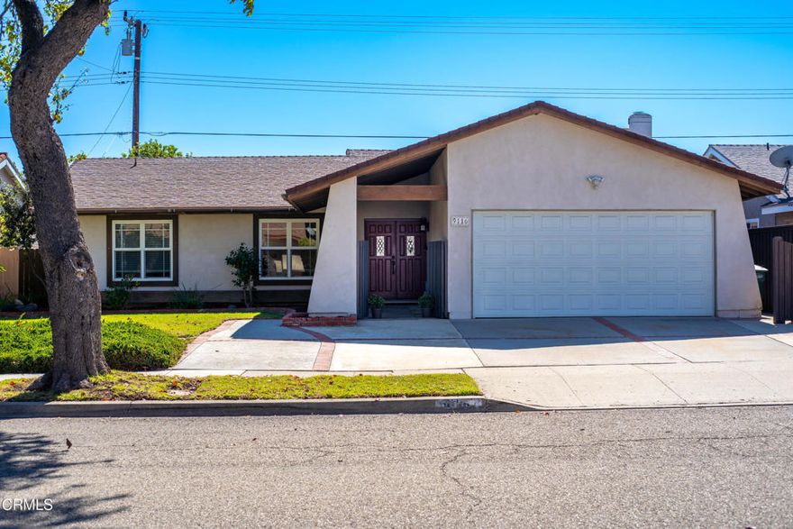 Lovely Single-Story Home with Custom Upgrades Throughout! Step into this beautifully upgraded home featuring an open and spacious floor plan with vaulted ceilings and elegant archways that create a bright, airy ambiance - making the home feel even larger than its square footage suggests. Wood like plank flooring, dual-pane windows, recessed lighting, and central A/C for year-round comfort. The cozy living room boasts a gas fireplace, perfect for relaxing evenings. Custom oversized picture window in the kitchen brings the outdoors in, offering beautiful natural light. Charming kitchen provides breakfast bar, newer gas range, built-in microwave, stainless steel dishwasher, pull-out pantry shelving, and refrigerator (included without warranty). The large dining area features a built-in buffet and opens directly to a private entertainer's backyard oasis. Designed for low-maintenance enjoyment, the backyard includes an expansive pergola-covered patio, built-in gas firepit, tranquil fountain, ample seating space for outdoor living, hook-ups for gas BBQ, and even a putting green! Retreat to the serene primary suite with a built-in dresser and TV nook, two closets, dual vanity, soaking tub, separate walk-in shower, and direct access to the backyard. One of the secondary bedrooms is currently used as a home office, complete with built-in desk and shelving in the closet. The stylishly updated hall bathroom features a walk-in shower with a sleek glass enclosure. This home is a must see to fully  appreciate the value-added features rarely found at this price point. Additional highlights include extra driveway parking and no rear neighbors. Located just a short stroll from a nearby park in a desirable, well-established East Ventura neighborhood. Don't miss the opportunity to make this wonderful house your home!