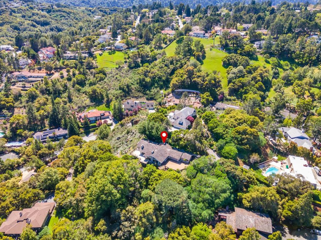 Private and secluded mega view oasis in Hillsborough. Known for being an affluent peninsula community highly regarded for excellent schools, proximity to San Francisco Airport and being conveniently located equidistant between Silicon Valley and vibrant San Francisco. This 4 bedroom 3.5 bath updated mid-century gated property offers an open floor plan and modern high end conveniences including steam shower and wine refrigerator. Shopping and dining are moments away at Crystal Spring Village as well as the downtown San Mateo and Burlingame districts.
