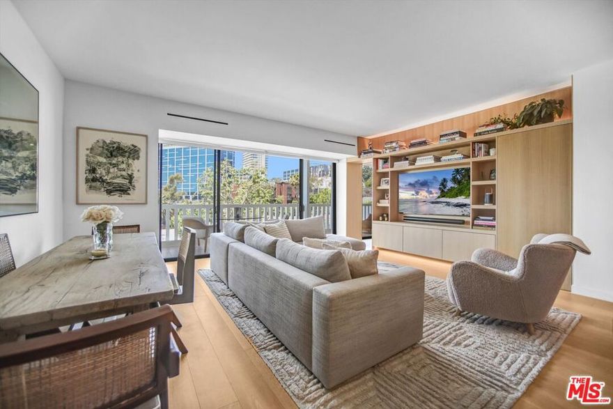 A rare opportunity to own in West Hollywood's most sought-after full-service buildings. This stunning, recently remodeled, one-bedroom residence with city/tree-top views at the prestigious Doheny West Towers.   This exceptionally bright and airy west-facing unit features an expansive open floor plan. The spacious living room features a custom, rift white oak built-in entertainment center with storage, as well as an adjacent dining area. The open kitchen has white cabinetry, stainless steel appliances, and an island. The separate office/lounge area features custom lighting and oak bookshelves. The bedroom also features custom-built-in white oak cabinetry, automatic shades, and direct access to the 35-foot balcony, which boasts limestone flooring and offers city and tree-top views. The expanded bathroom features a custom Calacatta countertop with an integrated sink, a Toto toilet, and a spacious walk-in shower with Waterworks fixtures. High ceilings and hardwood floors throughout. The full-service building completed an $8M+ renovation by a top AD100 interior designer, and has a 24-hour concierge/doorman, security, complimentary valet for guests, saltwater pool, gym, sauna, and laundry facility. Located in the trendy West Hollywood/Beverly Hills area, with close access to some of the best restaurants, shops, and hotels.