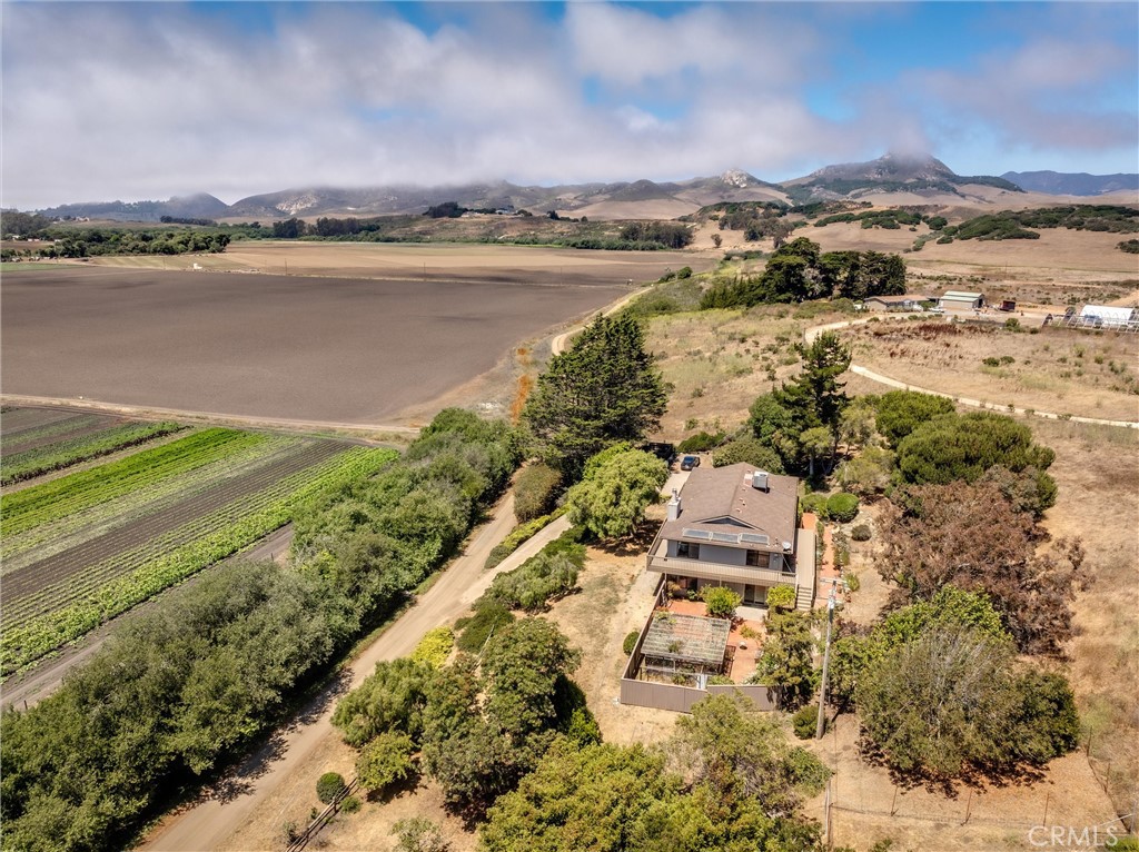 Central Coast Haven with Panoramic Views on over 3 Acres!
Discover an exceptional opportunity to own a private 3-bedroom, 3-bathroom custom-built estate nestled on 3 acres between San Luis Obispo and Los Osos. Perfectly positioned to capture sweeping hill, valley, and filtered coastal views, this 2,681 sq. ft. residence offers the ideal blend of tranquility, space, and convenience—just a short drive to the coast and town.
The upper/main level features a grand, light-filled living room, an inviting dining area, and a well-designed kitchen—all opening to a large, recently rebuilt wrap-around deck that showcases stunning vistas. Also on this level are two generously sized guest bedrooms, a full bath, and a spacious primary suite with panoramic views.
The lower level offers exceptional flexibility, with a large family/recreation room, a third bathroom, an interior laundry room, and a sizable office/den plus an additional bonus room—perfect for a home gym, media room, or easily converted into a fourth bedroom. With a separate entrance and ample space, the lower level offers strong potential for an attached accessory dwelling unit (ADU).
An oversized two-car garage accommodates both vehicles and hobbies with ease. Adding to the property’s unique charm, custom-built model train tracks span the grounds—a beloved feature of the home's 45-year family legacy and a potentially negotiable inclusion in the sale.
This is a rare chance to own a serene slice of the Central Coast, with room to live, grow, and create. Call your agent today to view this exceptional property before it's gone!
