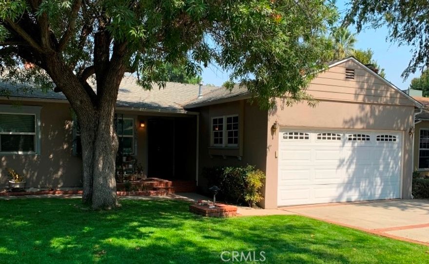 AVAILABLE NOW! Single-story Sherman Oaks home for lease. Amenities include: 3BR + 2BA floorplan w/approx 1500 SQF of space; living room w/fireplace; formal dining area; upgraded kitchen w/stainless steel appliances (stove, oven + dishwasher) + granite countertops; inside laundry w/stacked washer + dryer provided; en-suite bedroom w/three-quarter bath; central heat + air; ceramic tile + hardwood flooring; backyard w/sprinkler system; gardener included; attached, 2 car garage + driveway for parking; pets considered w/owners approval + additional deposit.