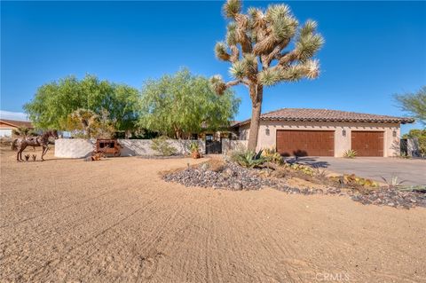 Photo of 61138 Onaga Trl, Joshua Tree, CA 92252 (MLS # JT26020459)