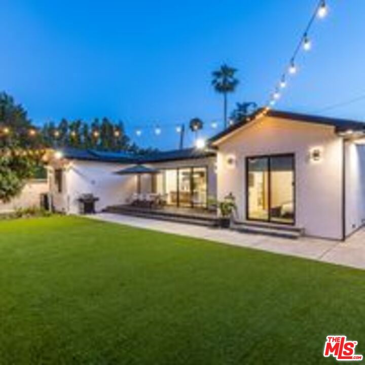 NEWLY-BUILT & MODERN WOODLAND HILLS HOME. FULLY-FURNISHED, FULLY-EQUIPPED. AVAILABLE FOR SHORT AND LONG STAYS. Beautiful & newly-constructed 3BD/2BA home in great Los Angeles location. Well-lit turf backyard w/ BBQ & covered outdoor dining area. Master ensuite w/ king bed, walk-in closet, TV, & sliding glass doors to backyard. Wall-to-wall open hardwood floor plan throughout. Gourmet kitchen w/ chef-grade appliances & breakfast bar seating. 4-car private driveway. Near many shops, restaurants, & entertainment options in the San Fernando Valley. Easy FWY access (101 & 405). ALSO The main home and detached ADU can be seamlessly combined to offer a total of 7 bedrooms and 6 bathrooms. Together they can be leased for $29,800 offering exceptional value and flexibility.
