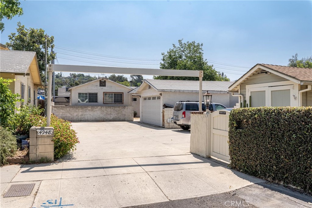 Enormous possibilities await the buyer of this major fixer property. This project is probably not a do-it-yourself special. Located on a charming street, in a prime Eagle Rock neighborhood, near the famous Casa Bianca restaurant, just imagine what this rectangular shaped lot can become. Currently the property contains a 2-bedroom, 2-bathroom house with a utility/laundry room. There is also a 2-car drive-through garage with attached bonus room, storage room and covered patio. This Trust Sale is being sold “as-is” by the successor trustee who has limited knowledge of the property. Buyers will be responsible for satisfying themselves for any and all questions regarding the property.