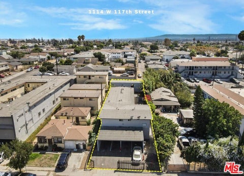 Photo of 1114 W 117th Street, Los Angeles, CA 90044 (MLS # 26964095)