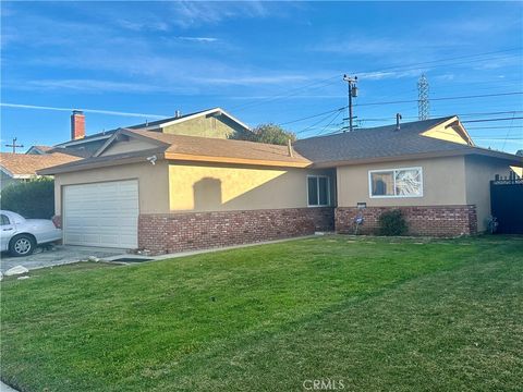 Photo of 15520 S Mckinley Ave, Compton, CA 90220 (MLS # PW26007658)