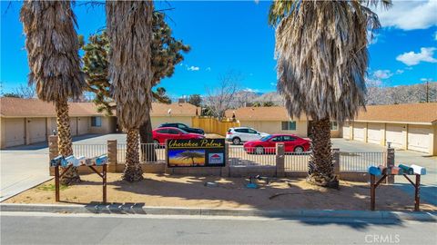 Photo of 7428 Cherokee Trl, Yucca Valley, CA 92284 (MLS # JT26047498)