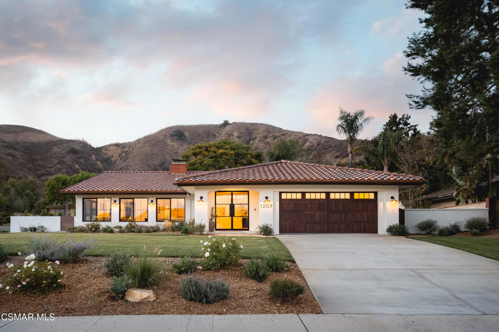 Spanish-Inspired Stunner with Ocean Views & Designer Finishes. Discover this stunning Spanish-style single-story showplace in Ventura's coveted Clearpoint community. Perched on a premium corner lot at the top of a cul-de-sac, this fully remodeled 3-bed, 3.5-bath home pairs ocean, mountain, and sunset views with high-end, designer-level finishes throughout. Step through a custom Pinky's Iron double-door entry into airy interiors featuring wide-plank French oak floors, vaulted ceilings, and walls of glass for seamless indoor-outdoor living. The open-concept layout flows from a fireplace-lit living room to a formal dining area and cozy family room. At the heart of this home is a gourmet kitchen with Arabescato Corchia marble counters, flanked by unlaquered brass faucets, hardware and ocean views. Here you will find full custom cabinetry with a rich green tone that blends the warm hues of brass and French oak beautifully. New appliances throughout are waiting for your arrival French doors off the breakfast nook open to a beautifully landscaped backyard retreat. The spacious primary suite offers direct access to the outdoors and a spa-like bath with Zellige tile, a soaking tub, a custom iron shower enclosure, and a walk-in closet. Two additional bedrooms and stylish bathrooms, including a powder room, provide comfort and privacy. The expansive backyard is built for entertaining, with dining area, lounge area, new grass and sprinkler systems, flagstone paths, fruit trees, views, and room for a future pool or ADU. Additional upgrades include: windows/doors, HVAC, electrical, plumbing, water heater, washer/dryer, new roof, epoxy-finished garage, designer lighting, new stucco, and more. This home blends luxury, style, and the best of California living--schedule your private tour today!