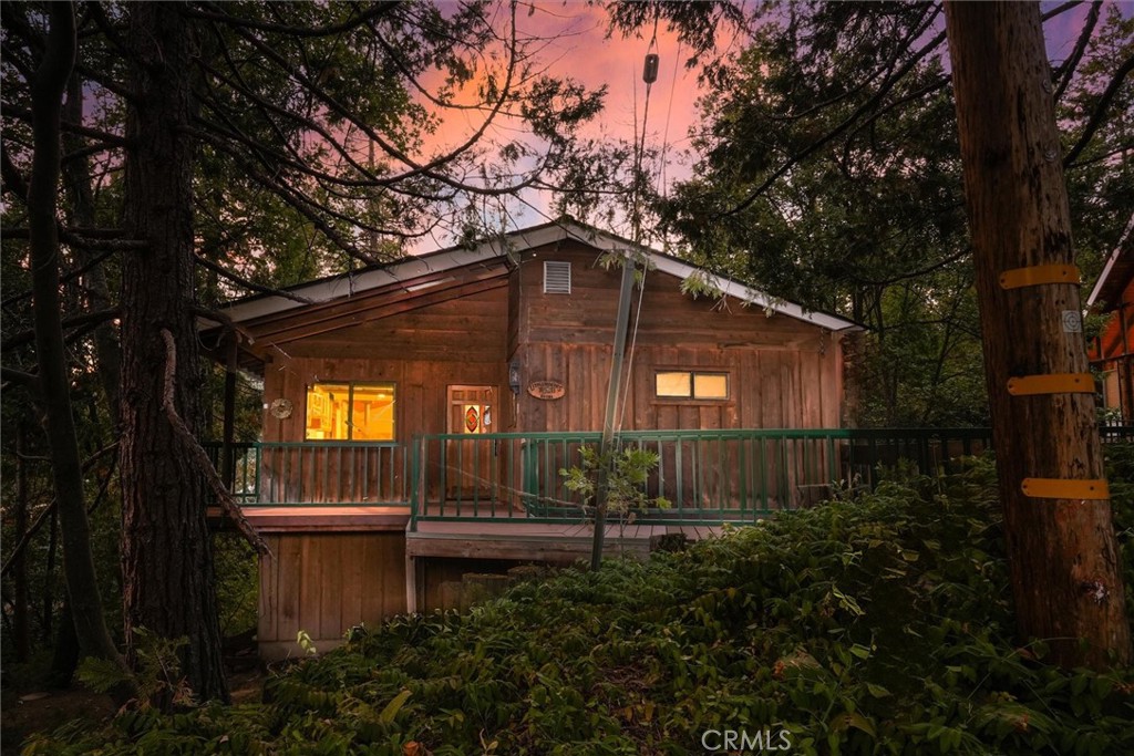 This is THE opportunity in Willow Cove at Bass Lake!!! A beautiful home that needs some fixing up after snow damage that has potential for the additions your have been dreaming of. 4 bedroom, 3 bath at 2179 sq ft the 4th bedroom downstairs is unfinished & the upstairs laundry room & bathroom are down to the studs. Re-build the garage with a potential apartment or game room on top? Entertain on the 2 Large decks with bedroom access on each floor backing up to the forested ravine & seasonal creek. Duel AC for upstairs & down, Rinnai tankless water heater, T&G vaulted ceiling, breakfast bar & so much more. Located in the Pines Tract, it’s a great location to the lake & your dock slip on Oak Dock, walk to coffee, brunch or ice cream by the water. Bass Lake has so much to offer for fun, relaxing, retirement or investment. Live the Lake Life with Yosemite National Park at your “back door”.