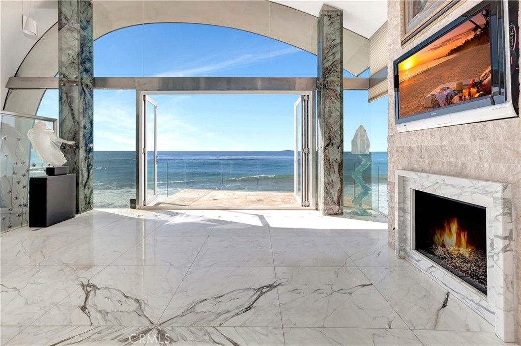 Photo of 1261 Ocean Front, Laguna Beach, CA 92651 (MLS # LG25026748)